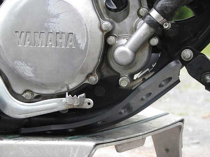 Right side of the black HDPE plastic skid plate for Yamaha YZ85