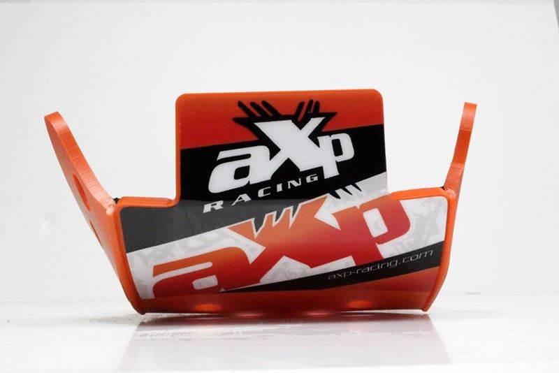 Front view of the 6mm orange PEHD plastic skid plate for KTM 125SX - 150SX