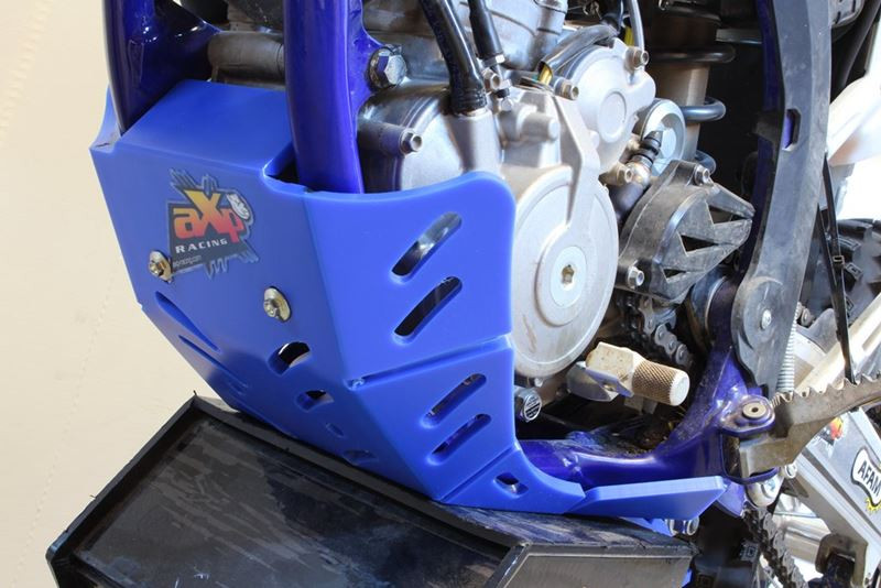 Left side of the blue HDPE plastic skid plate with linkage guard for Sherco SER250F - SER300F