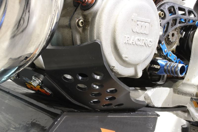 Left side of the black HDPE plastic skid plate for TM Racing 250 - 300