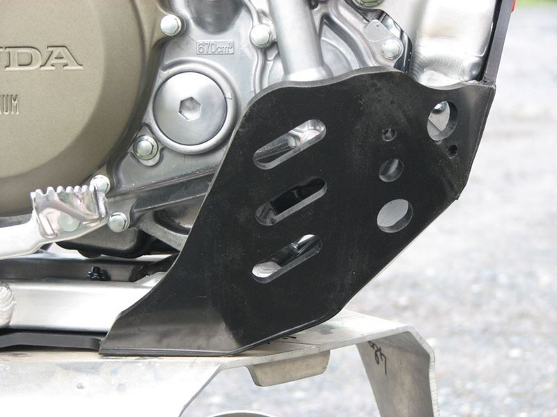 Left side of the black HDPE plastic skid plate for Honda CRF450X